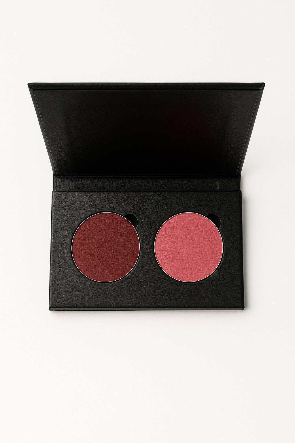 Makeup compact with two shades of blush on a white background
