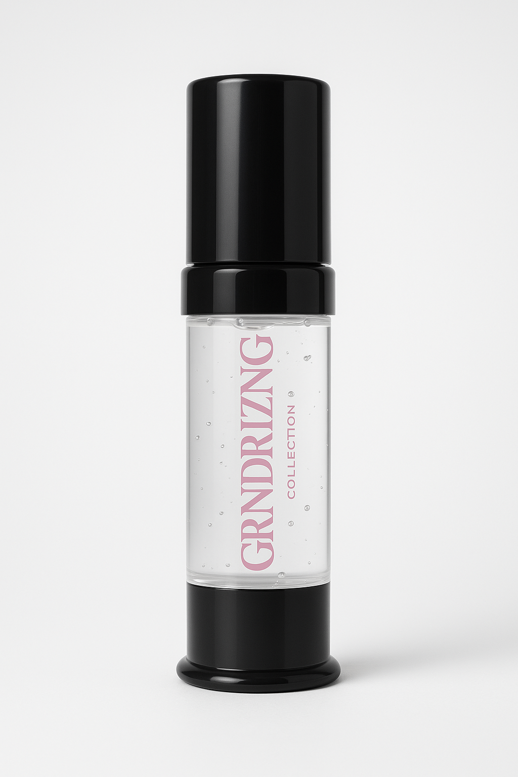 Clear bottle with black cap labeled 'GRNDRIZIING Collection' on a white background