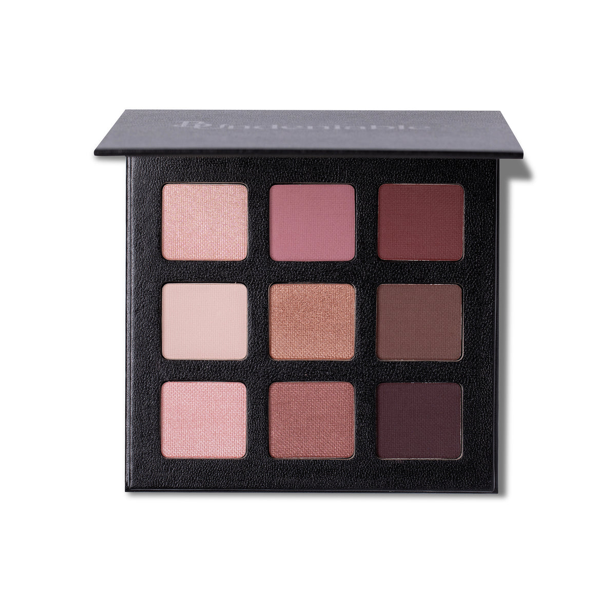 A 9-shade eyeshadow palette in a textured black compact, shown open against a white background. The shades range from light pinks and beiges to medium and deep browns and purples.