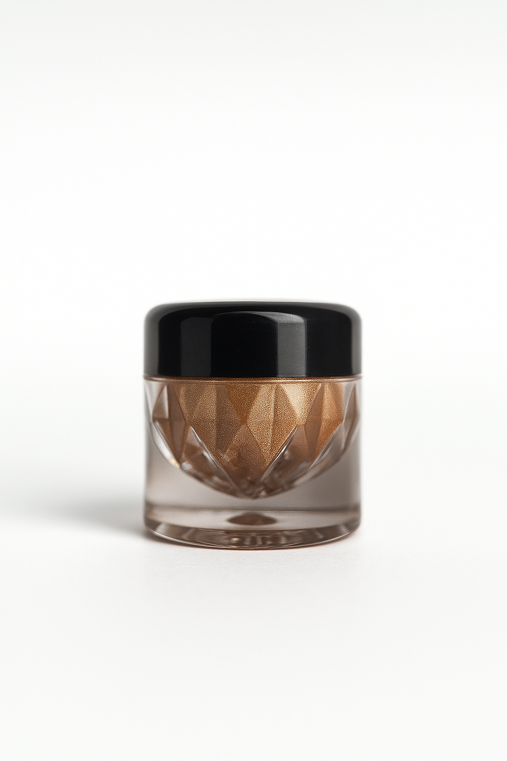 Cosmetic jar with a black lid on a white background